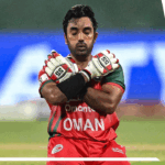 597043-aamir-kaleem-oldest-player.gif